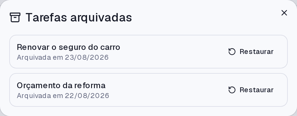 A janela Tarefas arquivadas, com a data de arquivamento e o botão Restaurar em cada item.